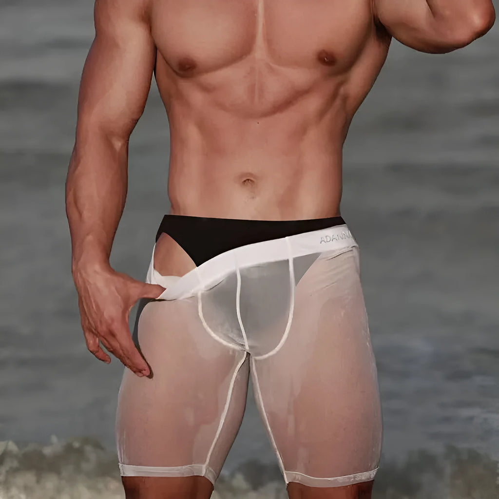 Men's solid colour knitted mesh lounge shorts in black on a hanger.