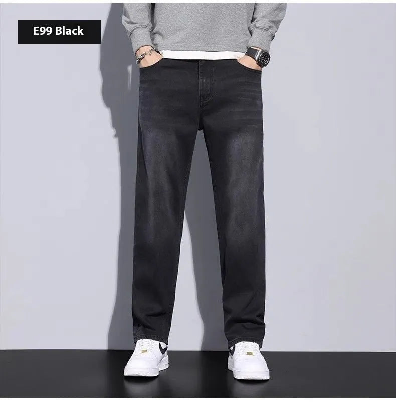 Men's straight leg casual jeans in black cotton denim with non-iron finish, side view.
