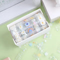 Five rolls of transparent adhesive tape with colourful midsummer daisy cartoon decoration for DIY diary projects