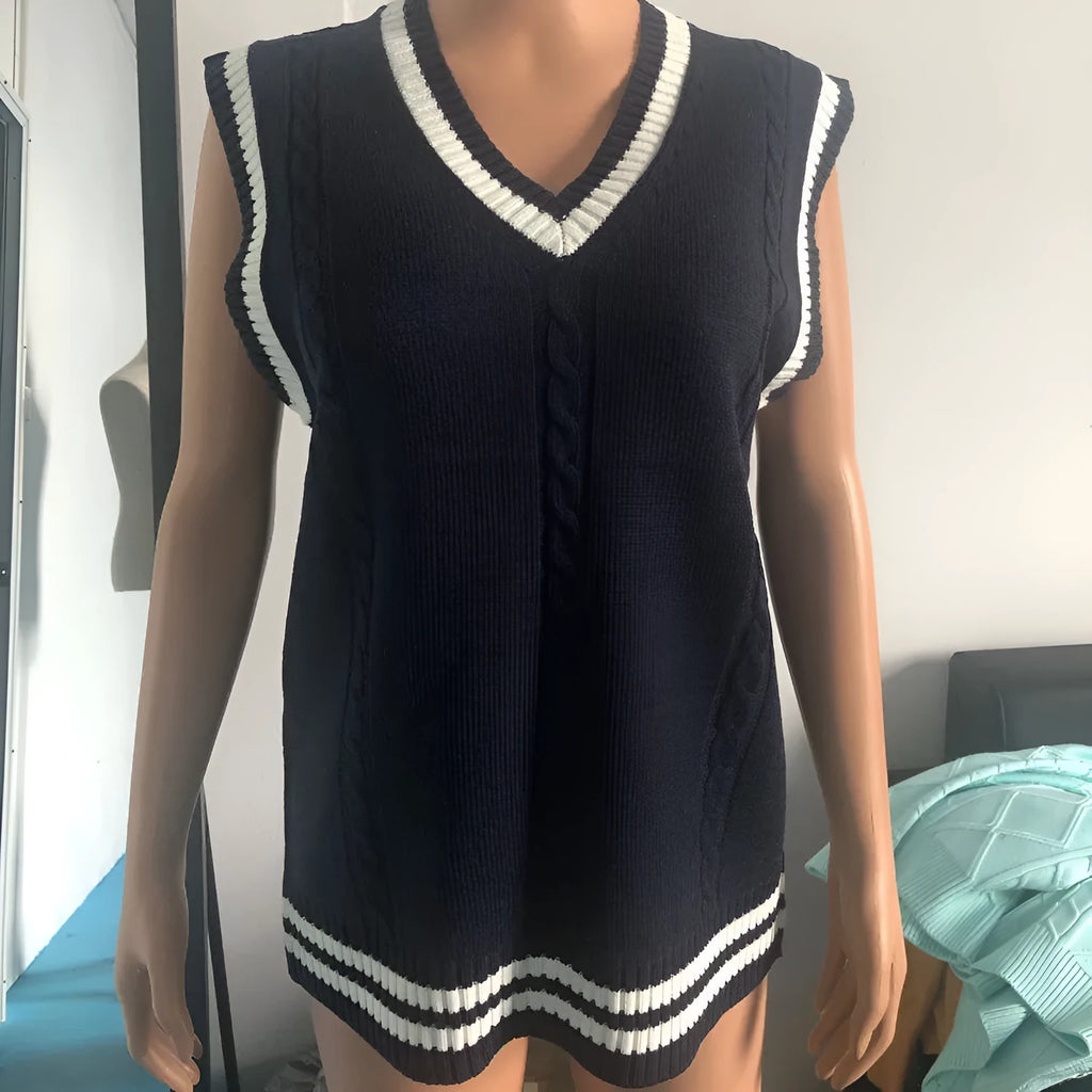 Women's slim fit V-neck striped acrylic sweater in wine red colour showing waistcut design