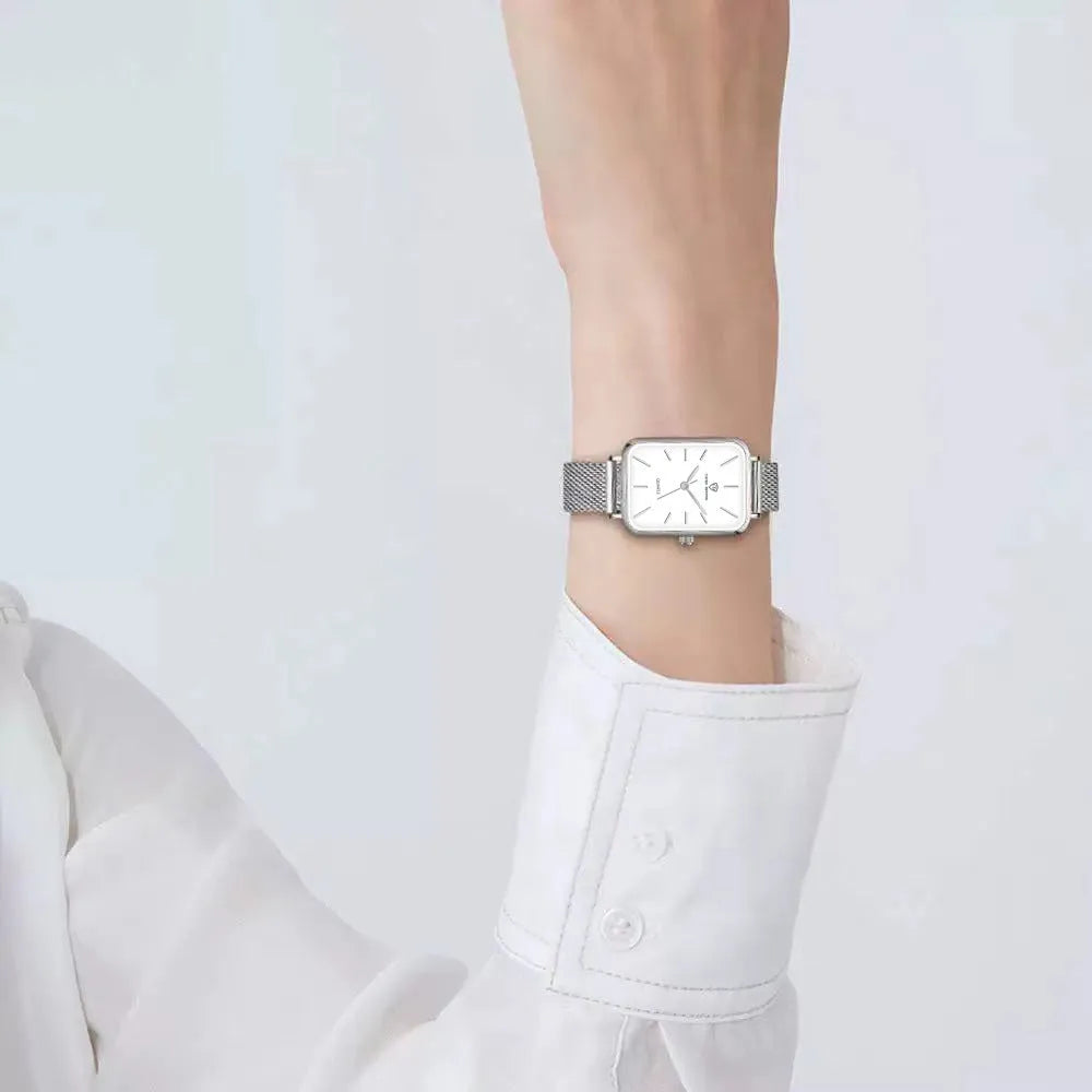 Women's rose gold or silver waterproof quartz watch with alloy case and woven steel strap.