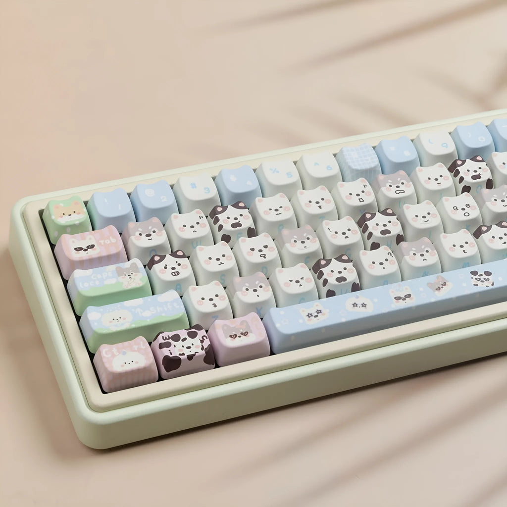 Complete set of 127 PBT key caps with sublimated cat and puppy designs for mechanical keyboard customisation