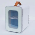 Pink mini refrigerator with transparent door showing dual hot and cold functionality for car and home use