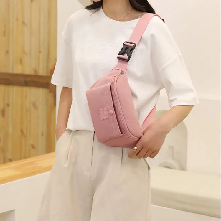 Large capacity crossbody nylon fanny pack for women in eight colours with zipper closure and internal pockets for running and travel