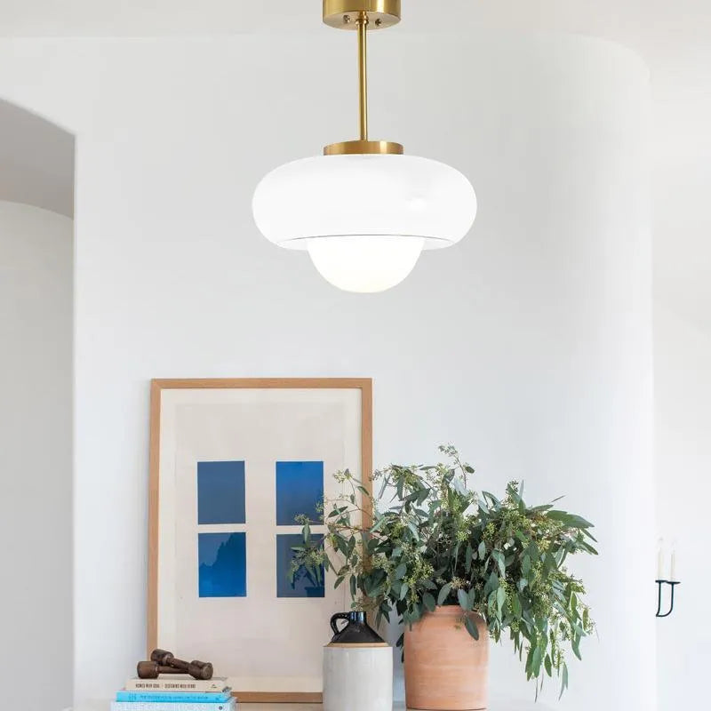 Bauhaus style three headed egg tart pendant light with glass shades in milky white finish