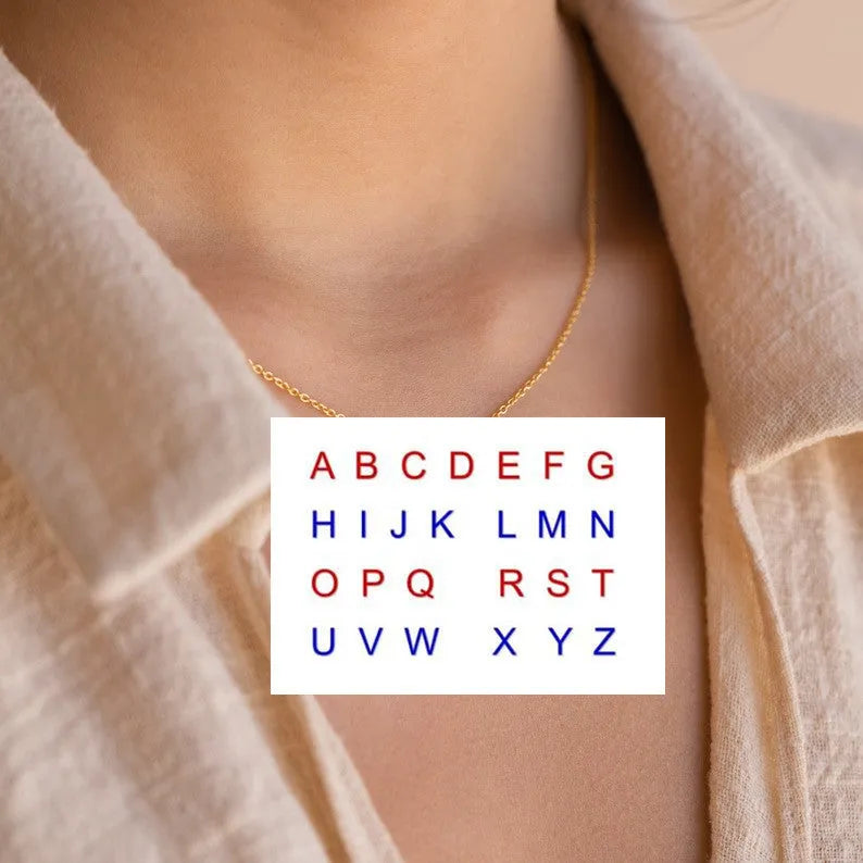 Stainless steel letter necklace with mixed gem inlaid pendant on an adjustable O-ring chain in silver finish