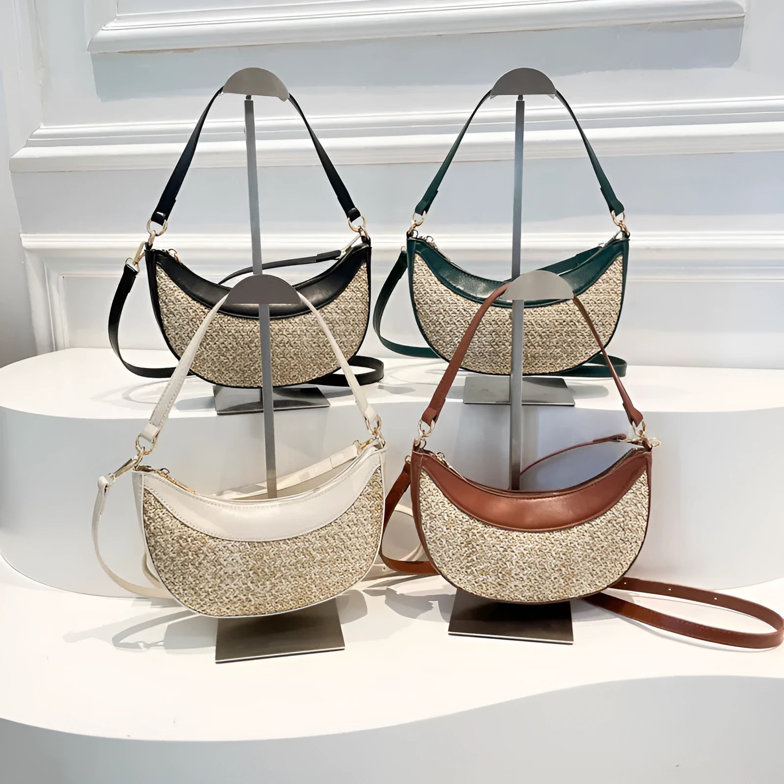 Women's straw crossbody dumpling bag with internal organisers for phone, documents, and change