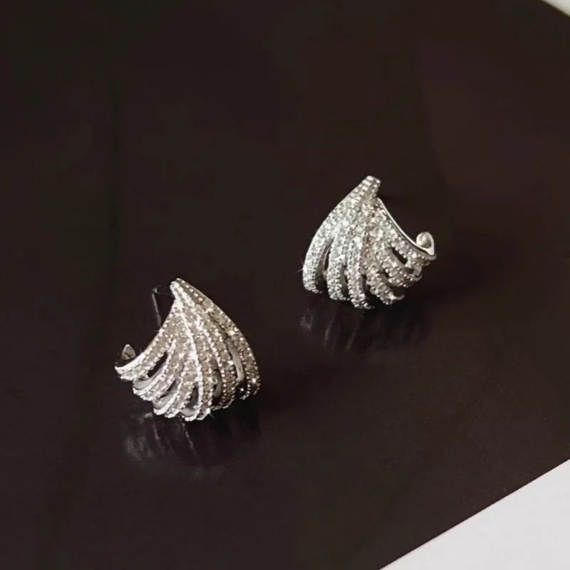 Platinum-coloured geometric zircon earrings with clean line design and electroplated finish
