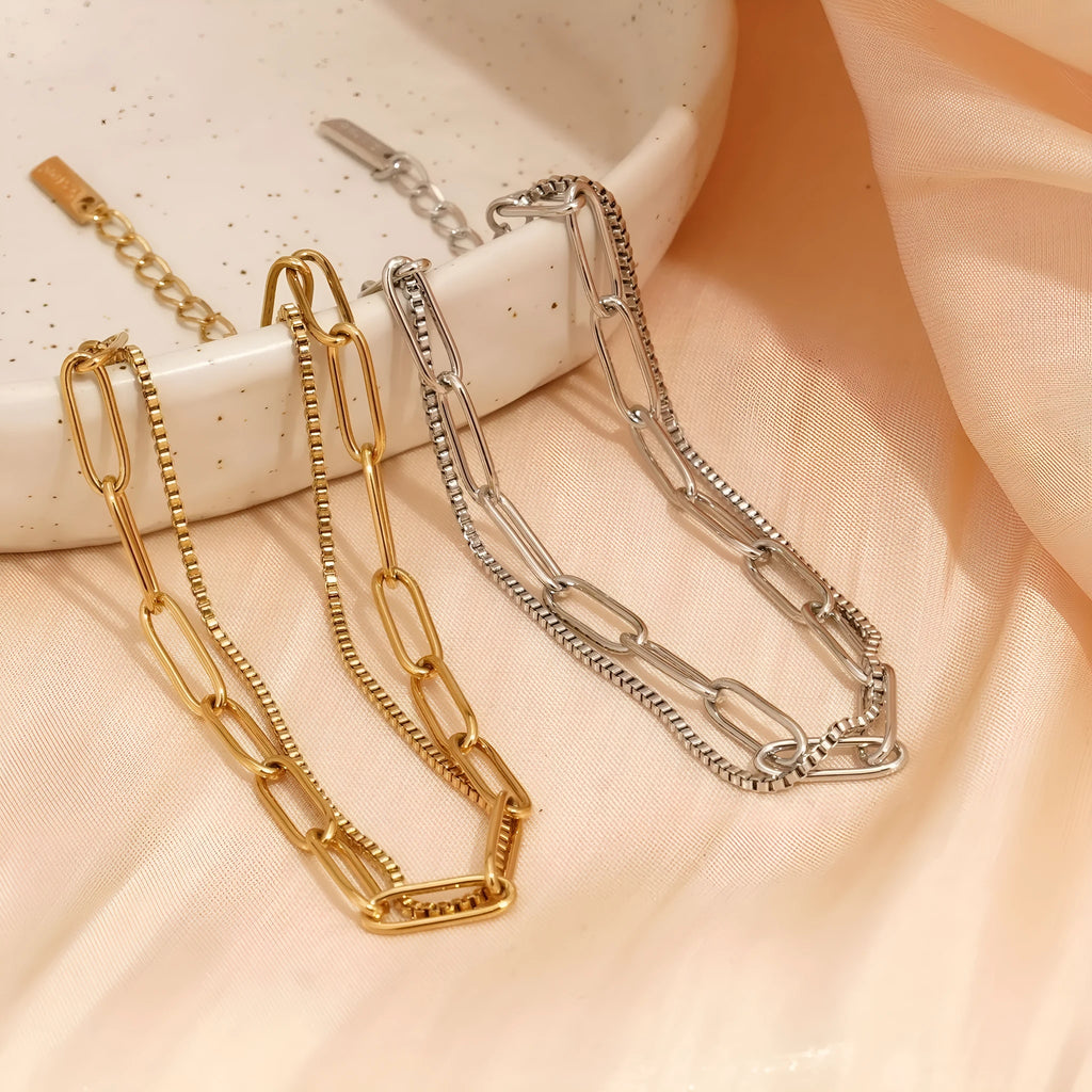 Geometric women's bracelet with twin titanium steel double-layer construction in gold or silver finish