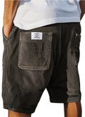 Men's gray corduroy shorts with embroidery detail on the front pockets, showing straight leg fit.