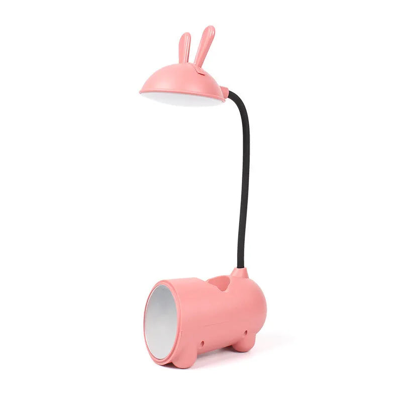 Green cartoon desk lamp with USB power and built-in pen holder container on desk