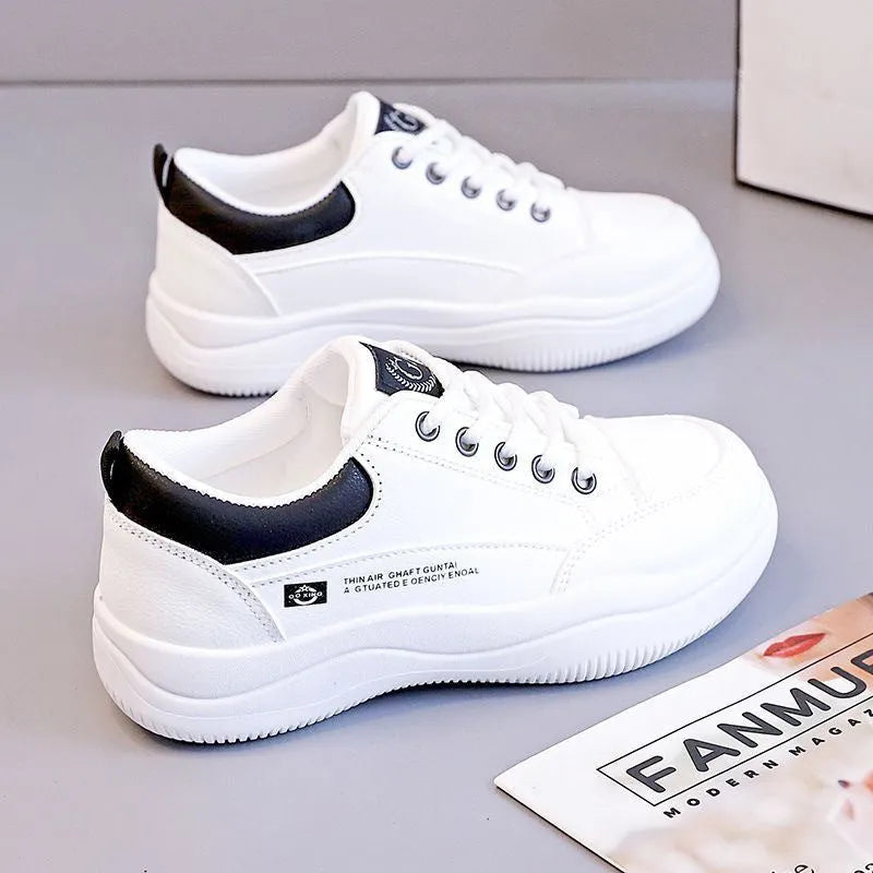 Women's white Korean-style lace-up shoes with cross-strap detailing and round toe