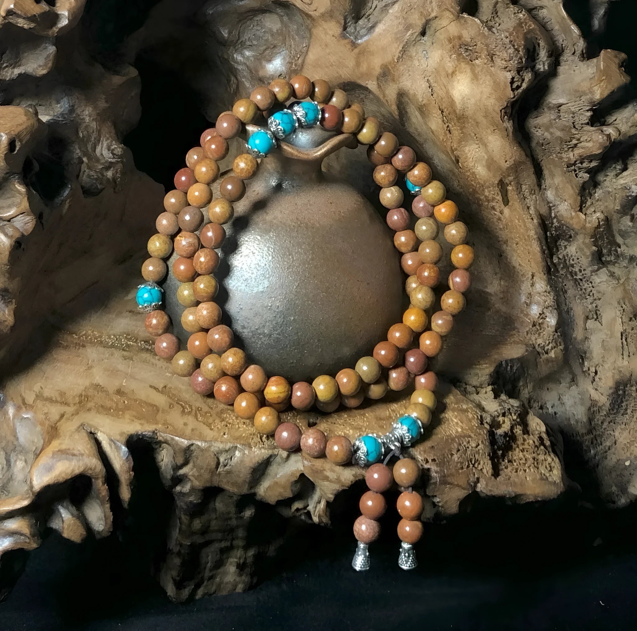 Hand-polished Lvzhu stone bracelet with 108 geometric beads measuring 5-6mm diameter