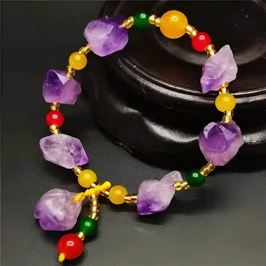 Natural purple amethyst bead bracelet for women with a silver Fu character charm.