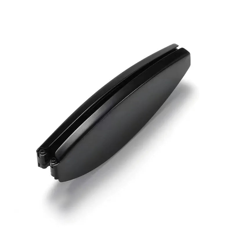 Folding reading glasses with retro metal frame in black and silver colours, showing compact folded size