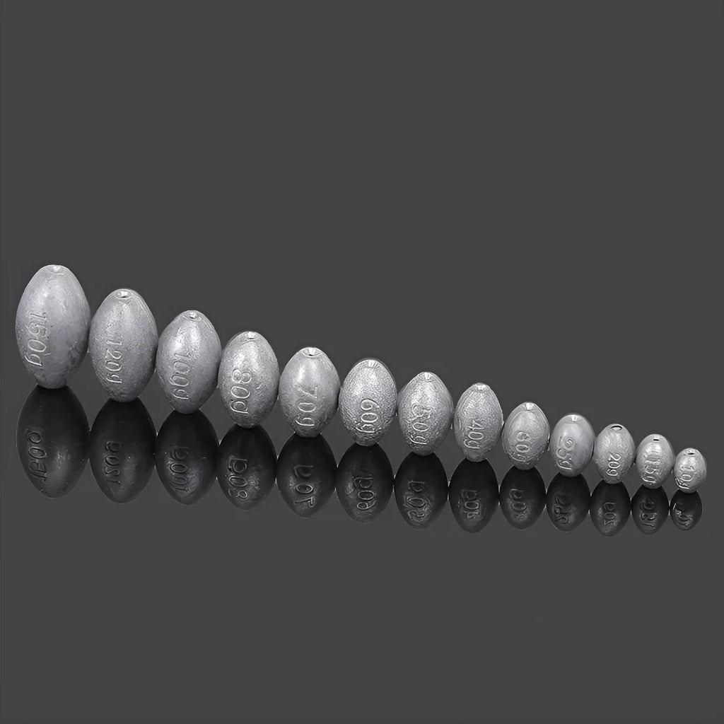 Close-up of a rugby-shaped olive lead fishing sinker with a Tongxin scale pattern texture.