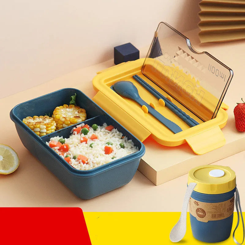 Green four-layer partitioned bento lunch box with Nordic style design, shown open.