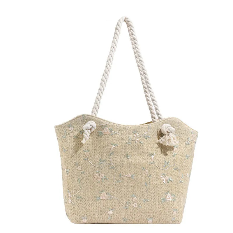 Large capacity straw shoulder bag with flap closure and phone pocket in khaki colour
