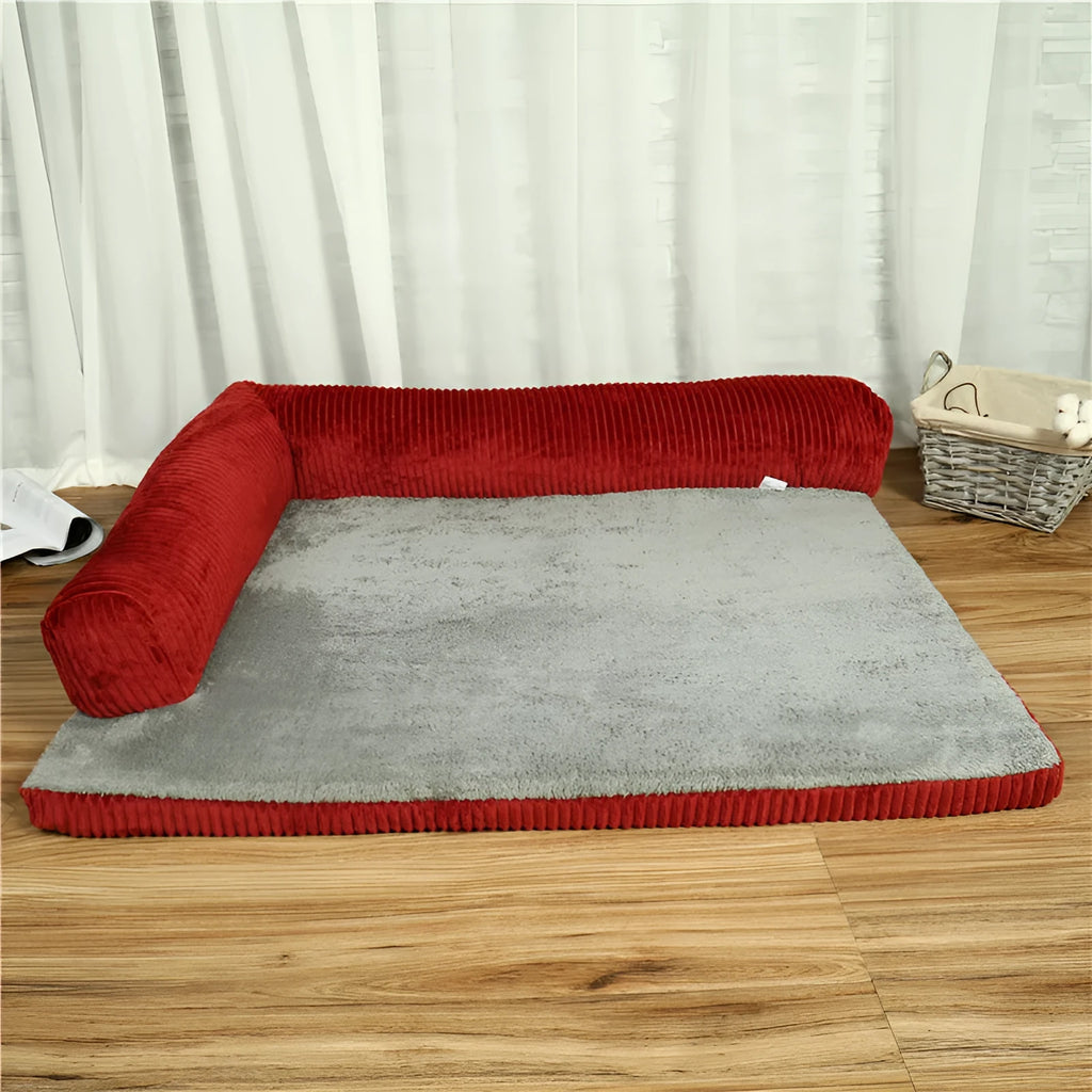 Corduroy pet sofa dog bed in grey, showing removable cover and non-slip base, placed on a hardwood floor.