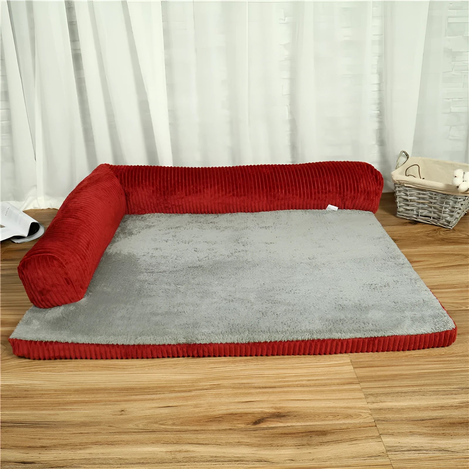 Corduroy pet sofa dog bed in grey, showing removable cover and non-slip base, placed on a hardwood floor.