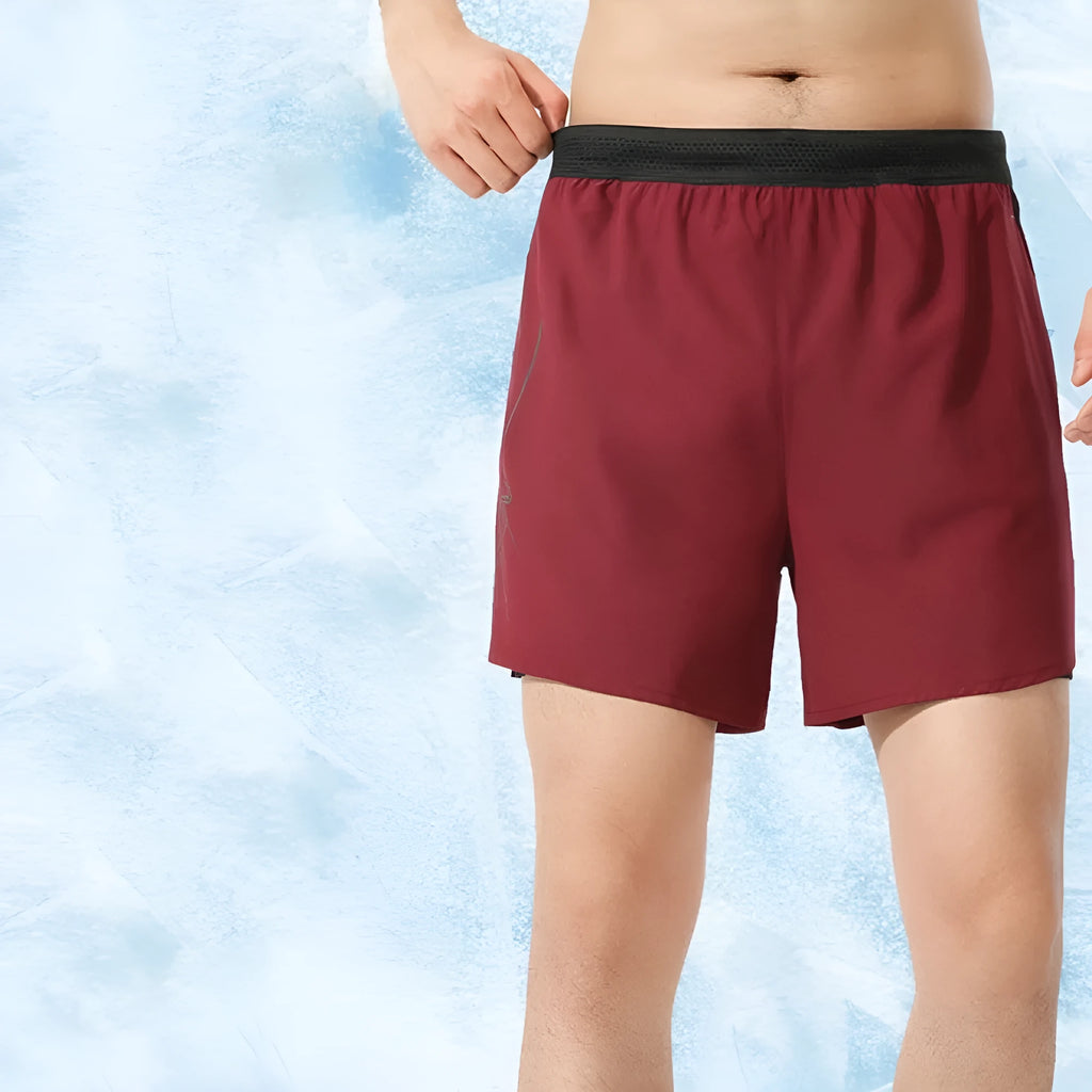 Men's low waist polyester basketball shorts in a solid colour, shown in one of the available colour options.
