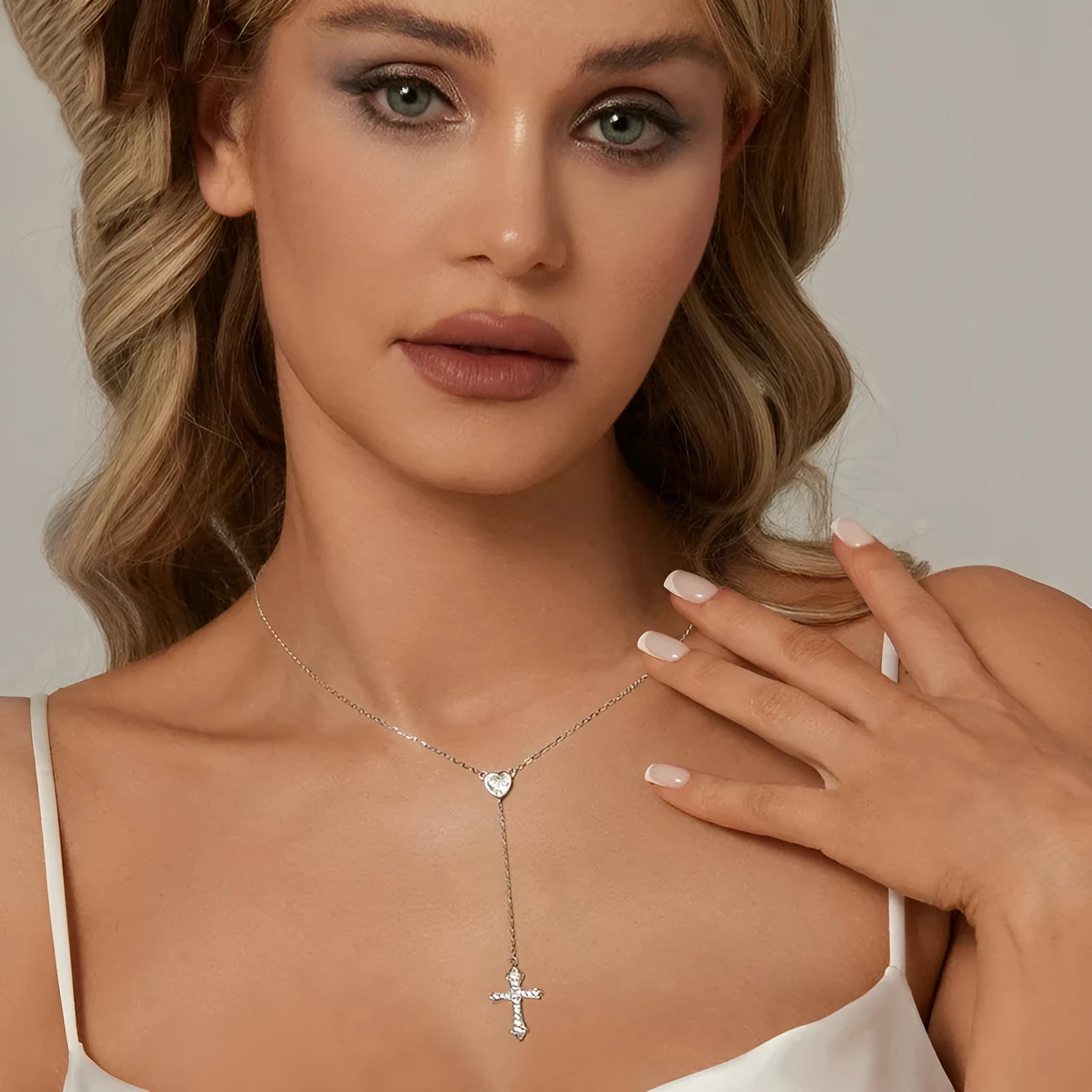 925 sterling silver Love Cross pendant necklace with V-neck design on an O-ring chain.