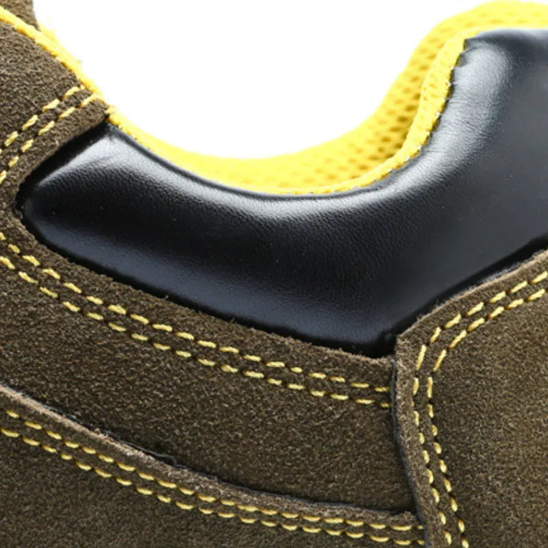 Bronze coloured cow suede leather safety boots with a steel toe cap on a non-slip sole.