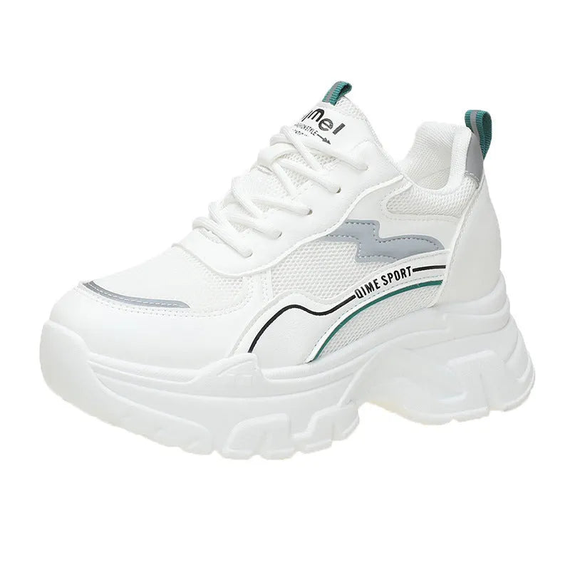 Women's white and beige low-top lace-up sports shoes with a breathable mesh upper.
