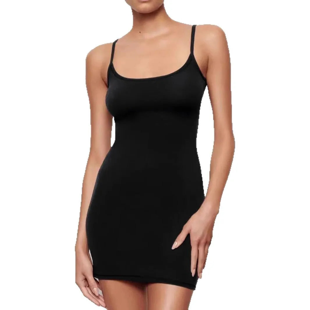 Black sleeveless sling dress with skinny sheath silhouette and mid waist design
