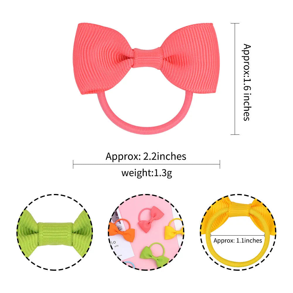 80-piece baby hair ties with bows set showing multi-coloured grosgrain ribbon bows attached to elastic bands