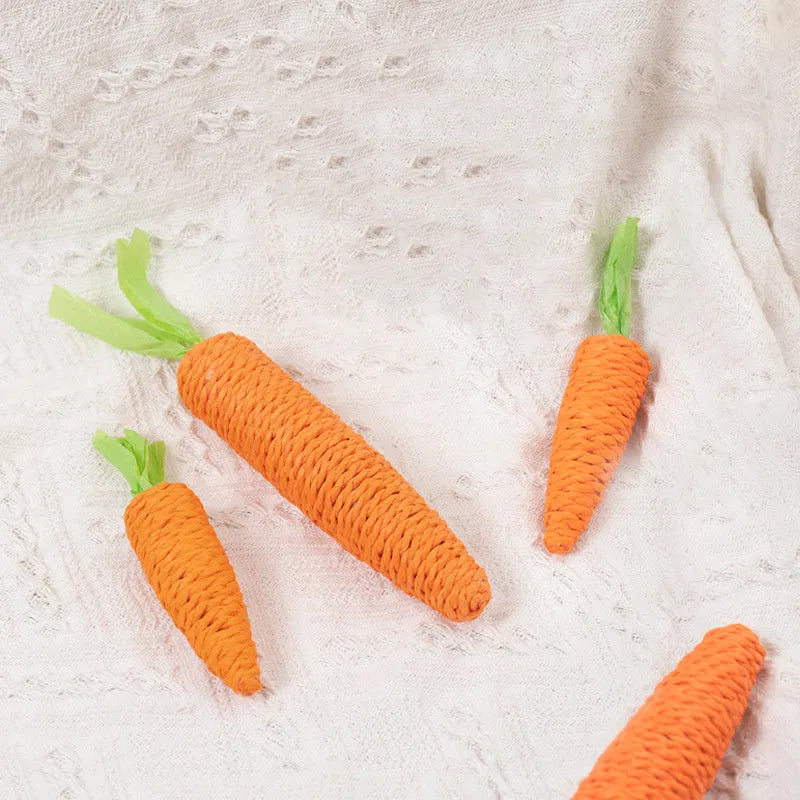 Set of interactive cat toys including carrot bites, paper toys, ringing stones, sticks and tooth grinding items