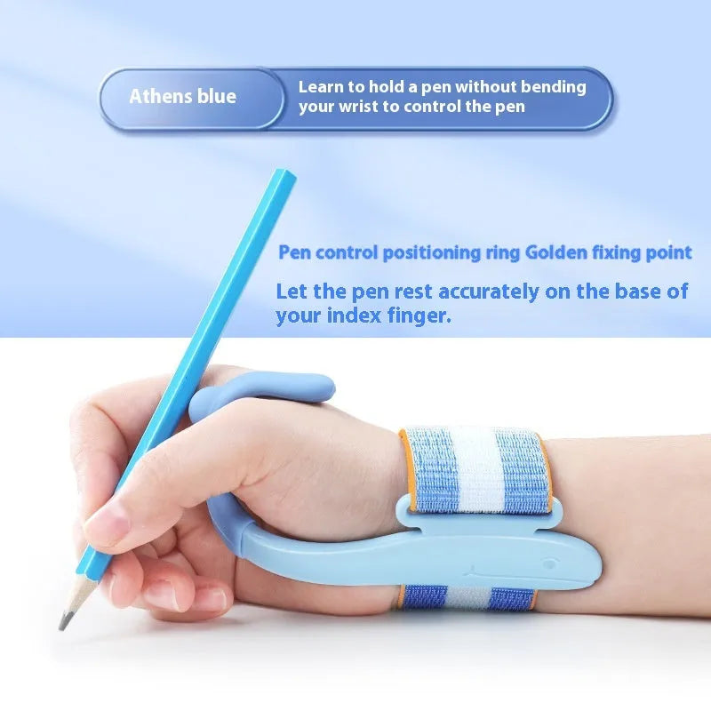 Blue anti-hook wrist brace pen corrector for children's handwriting posture on a desk.