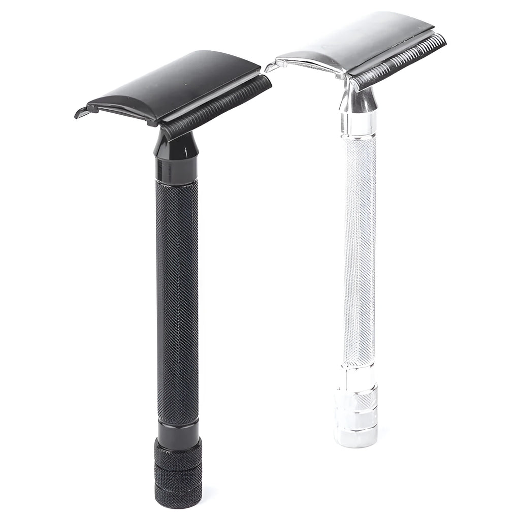 Traditional manual shaving razor and brush set in silver and black finish on a wooden surface.