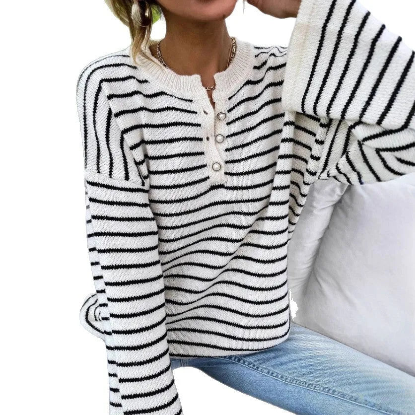 Black and white striped women's casual top with drop-shoulder sleeves and loose fit