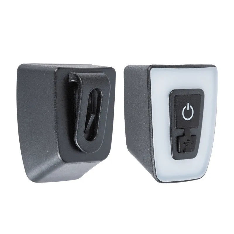 USB rechargeable bicycle taillight in black mounted on helmet with 3 lighting modes