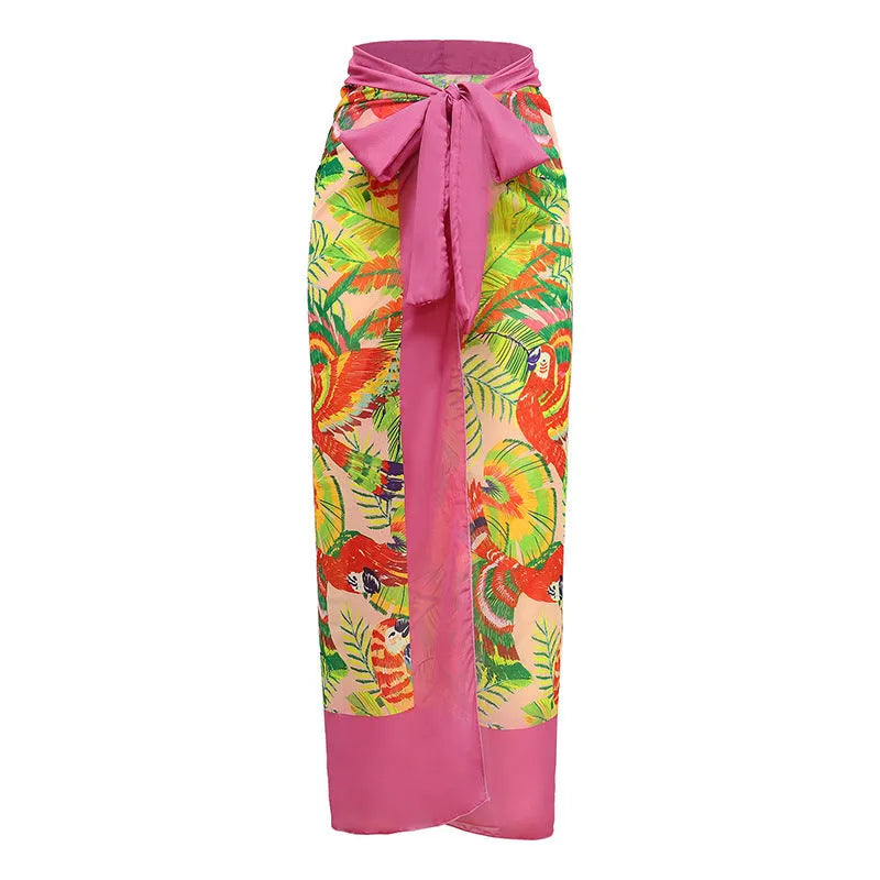 Pink floral print one-piece swimsuit with V-neck, covered belly design, and attached thin skirt