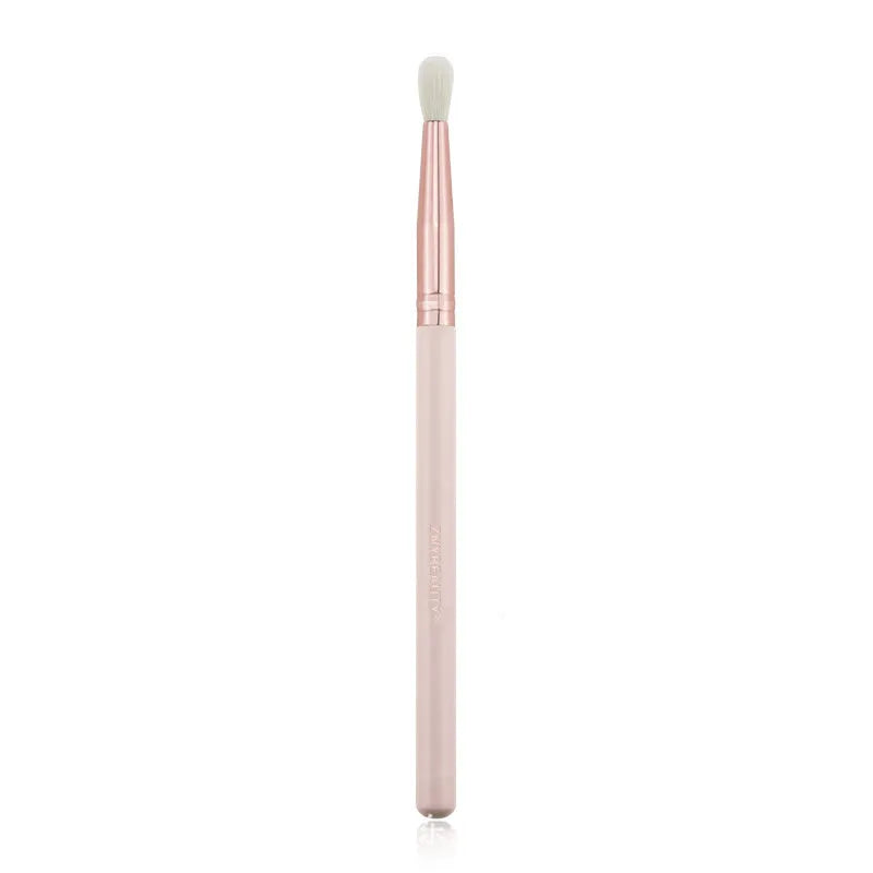 26 pink makeup brushes with wooden handles arranged in a PU carry case.