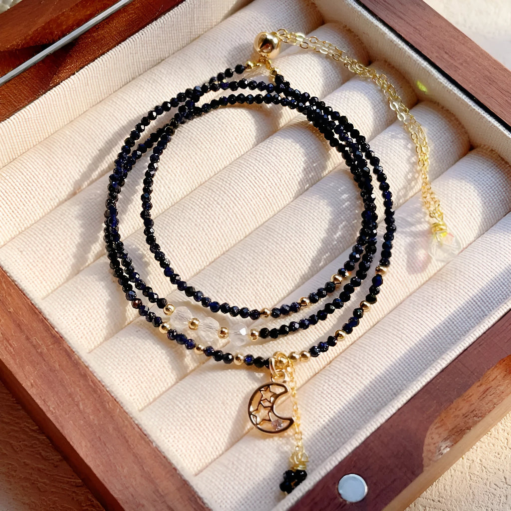 Blue sand stone three-ring bracelet with gold accents and adjustable closure