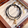 Blue sand stone three-ring bracelet with gold accents and adjustable closure