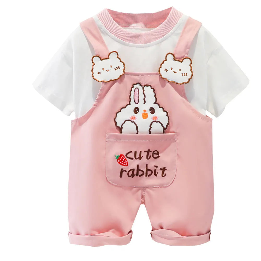 Baby wearing yellow cotton cartoon overalls with short sleeves and adjustable straps