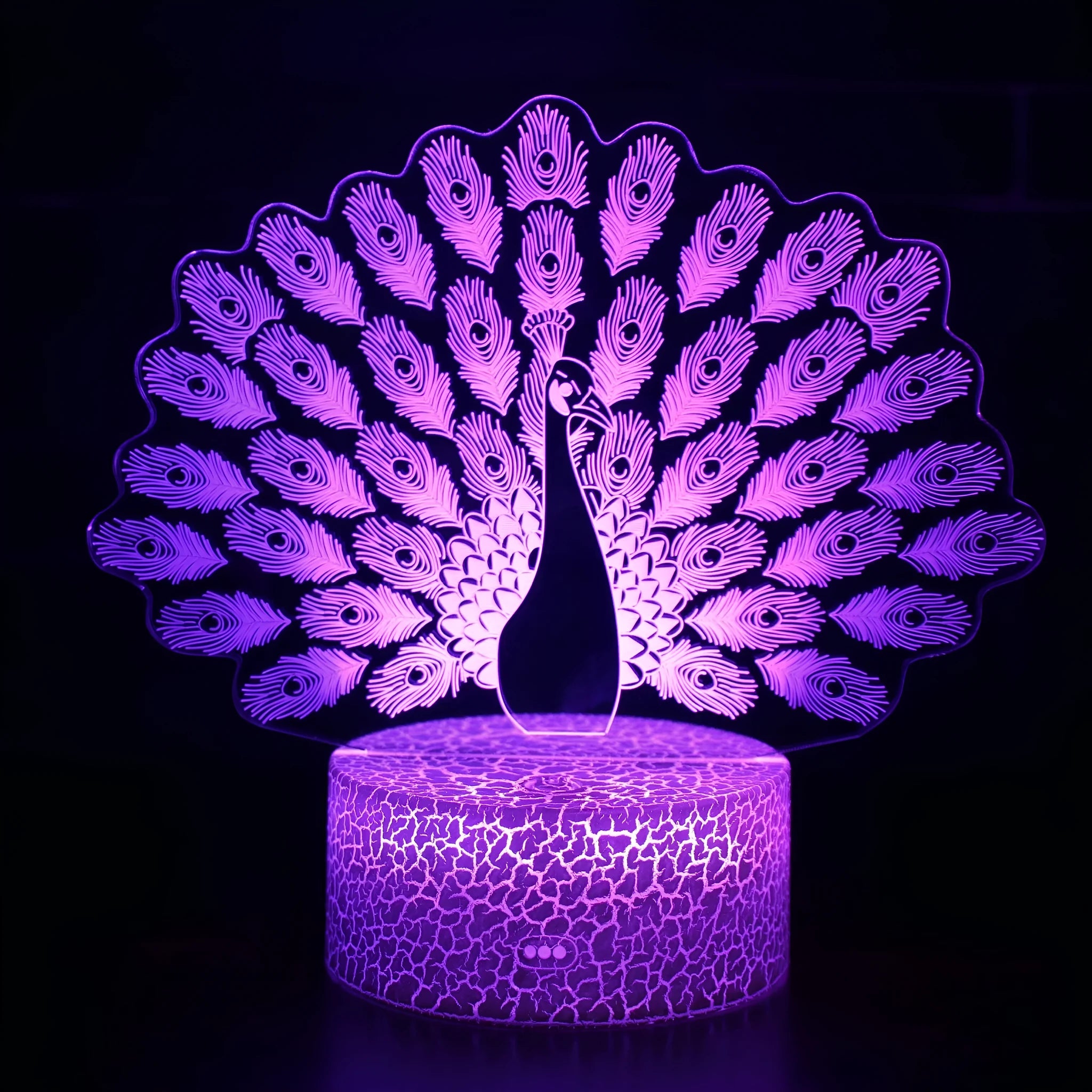 Acrylic 3D colourful touch USB table lamp with crack base design and LED light on a desk.