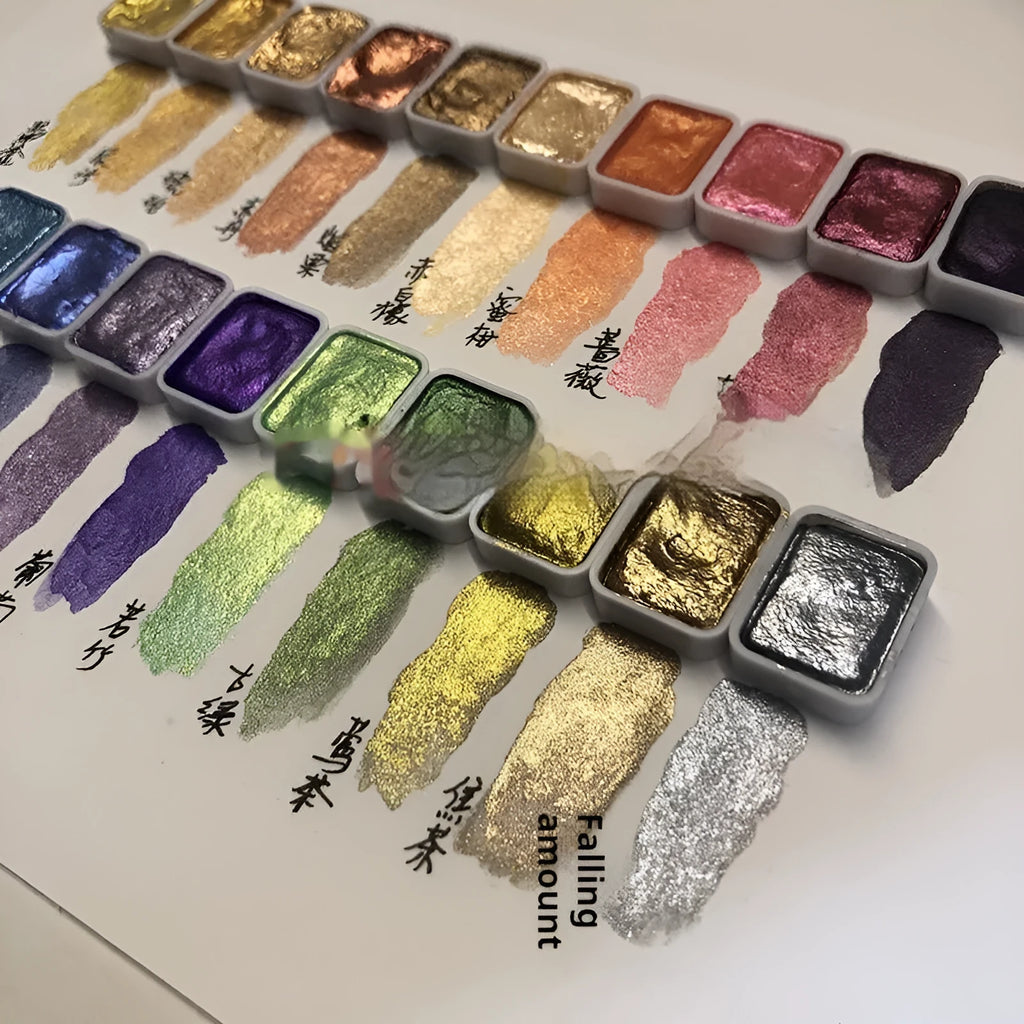 Traditional Chinese painting watercolour set showing tubes of red, white gold, and pearlescent colours.