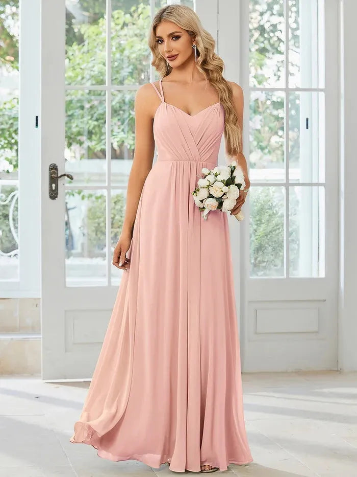 Women's long pleated A-line sleeveless dress in light green polyester fabric