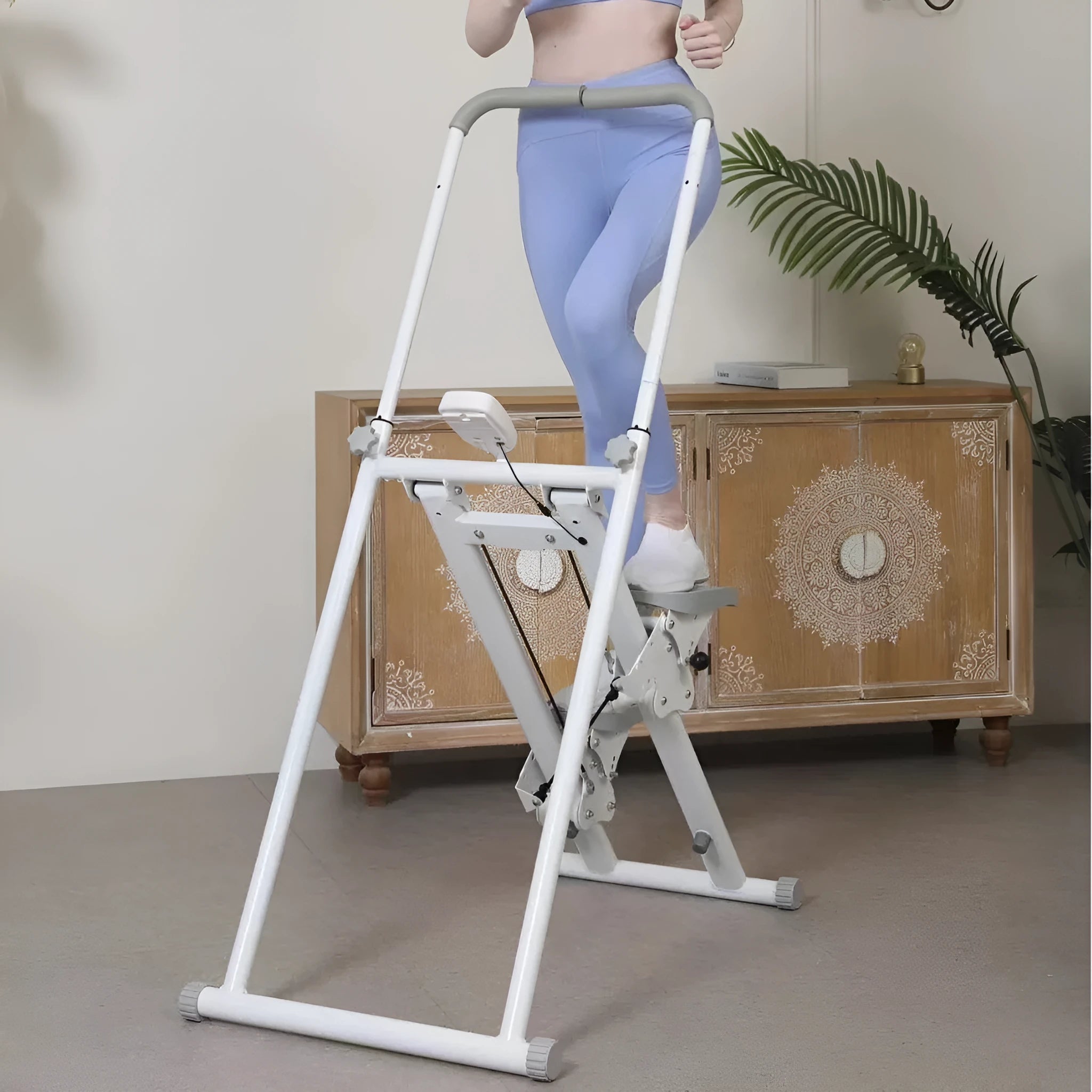 White folding treadmill with climbing frame attachment for multi-function home fitness exercise