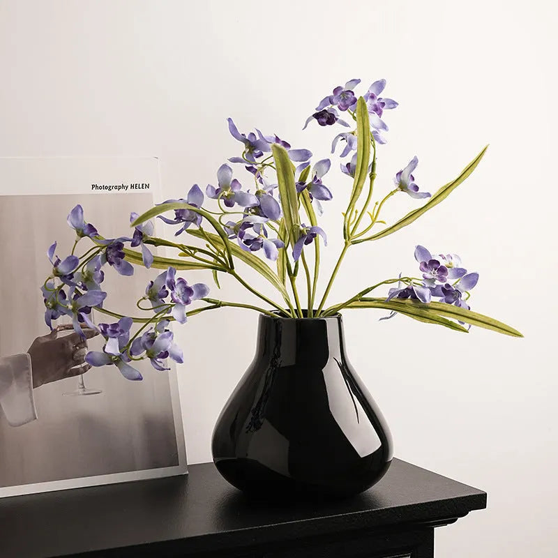 Ceramic decorative vase with round belly French design in black or white colour options