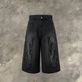 Men's black denim shorts with flame embroidery patch and straight leg cropped cut