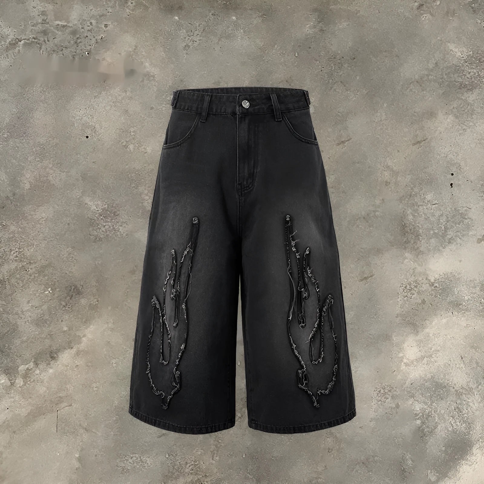 Men's black denim shorts with flame embroidery patch and straight leg cropped cut
