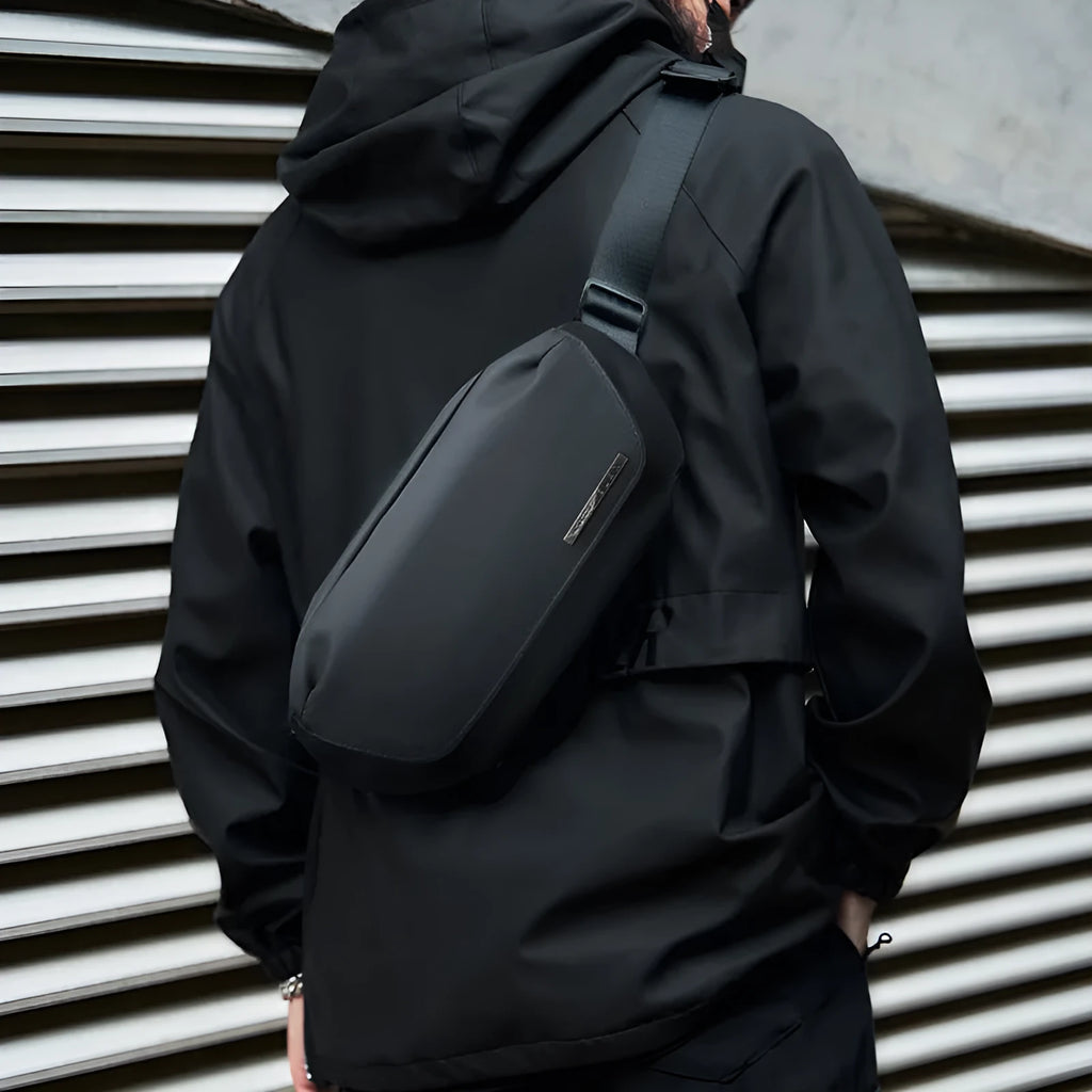 Black men's messenger bag with Oxford cloth exterior and one-shoulder riding design