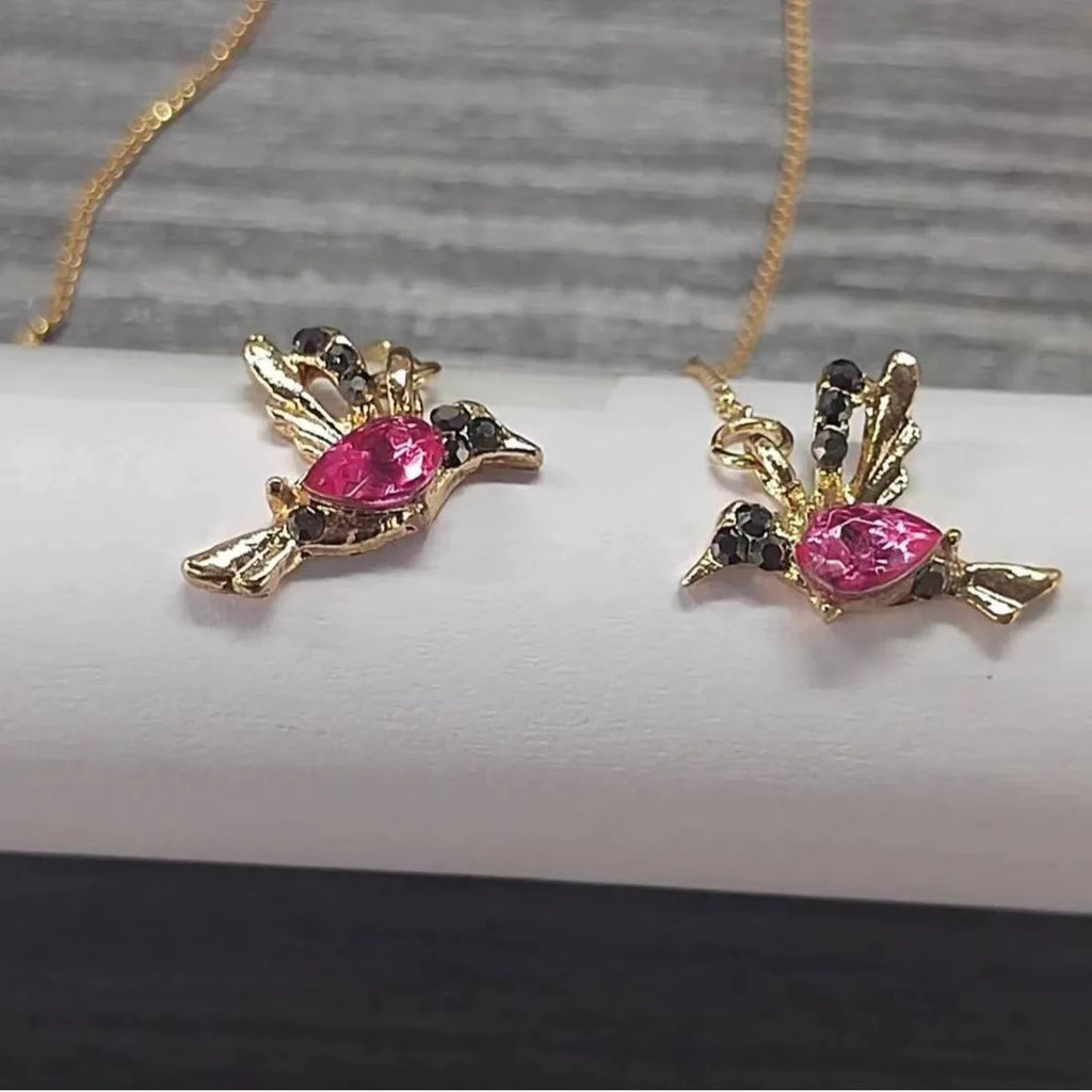 Long style hanging earrings featuring a bird design with mixed zirconium wings in red and blue electroplated alloy