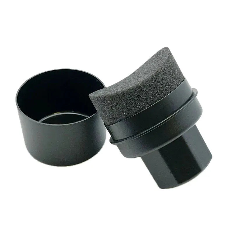 Black tyre polishing sponge brush with lid on a car tyre, showing high-density sponge applicator head.
